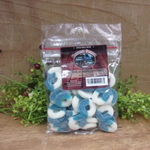 Blue Raspberry Gummi Rings, Backroad Country bag on a table
