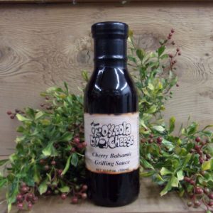 Cherry Balsamic Grilling Sauce, Osceola Cheese grilling sauce bottle on a table