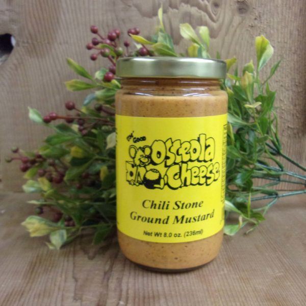 Chili Stone Ground Mustard, Osceola Cheese jar mustard  bottle on a table