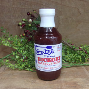 Hickory BBQ Sauce Curley's sauce bottle on a table