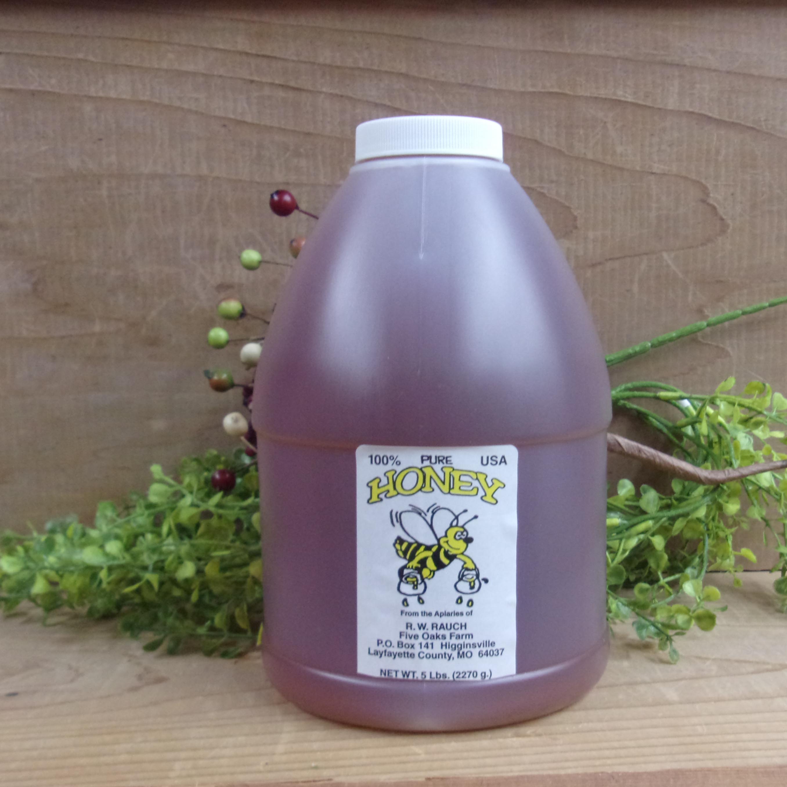 Jar of Honey jug on a table