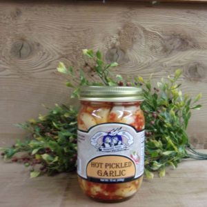 Hot Pickled Garlic, Amish Wedding garlic jar on a table