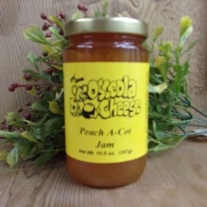 Peach A Cot Jam, Osceola Cheese jam jar on a table
