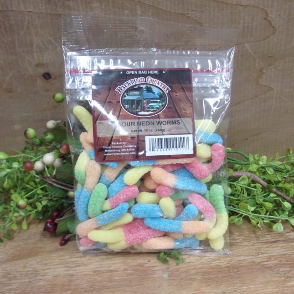 Gummi Sour Neon Worms, Backroad Country bag on a table