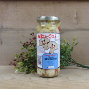 Garlic Italian Pickled Mushrooms jar on a table