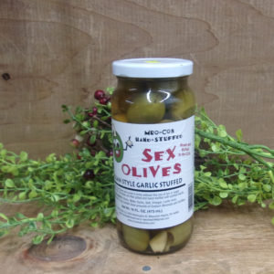 Garlic Stuffed Sex Olives jar on a table