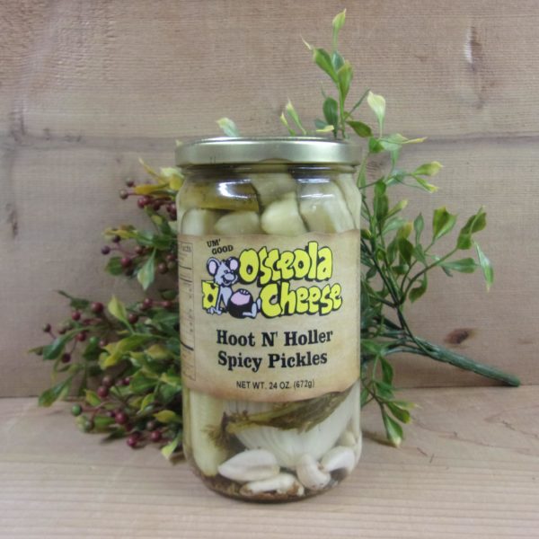 Hoot N Holler Spicy PIckles, Osceola Cheese pickles jar on a table
