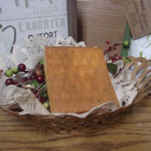Smokey Habanero cheese block in a basket on a table