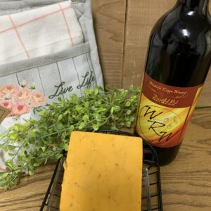 Raspberry Chipotle Cheddar cheese block on a table