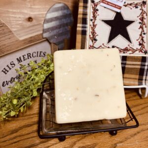 Garlic Parmesan Cheddar cheese block on a table