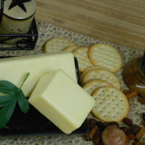HickorySmoked Garlic Cheddar cheese blocks on a table