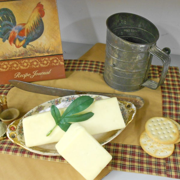 Hickory Smoked Jack cheese blocks on a table