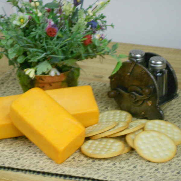 Hickory Smoked Cheddar cheese blocks on a table