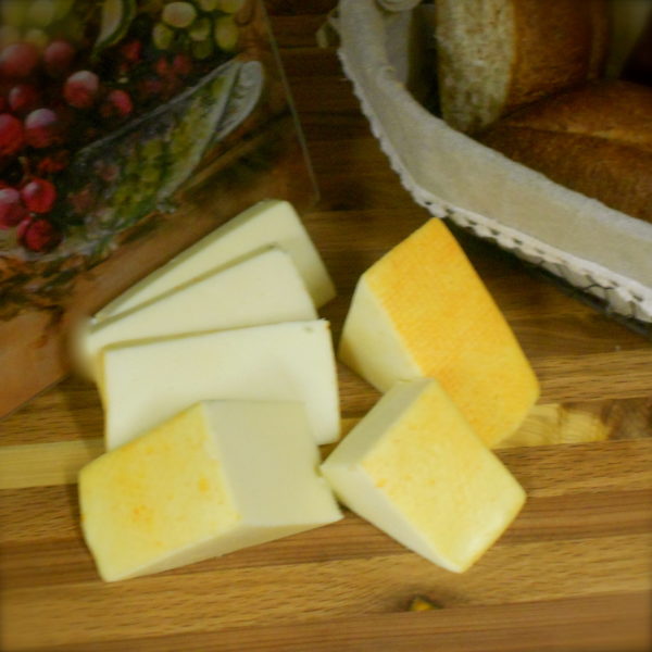 Muenster cheese blocks on a table