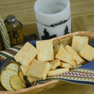 Hickory Smoked Mild Buffalo Wing Cheddar cheese slices in a basket on a table