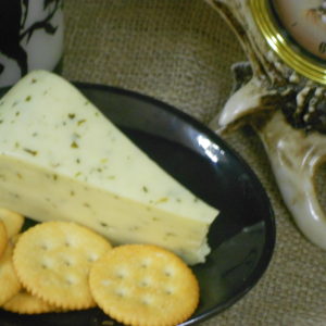 Morel Mushroom & Leek Jack cheese block on a table