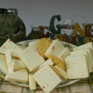 Caribbean Red Hot Jack cheese blocks on a plate on a table