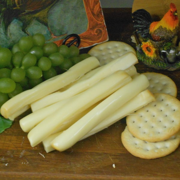 Smoked String Cheese tubes on a table