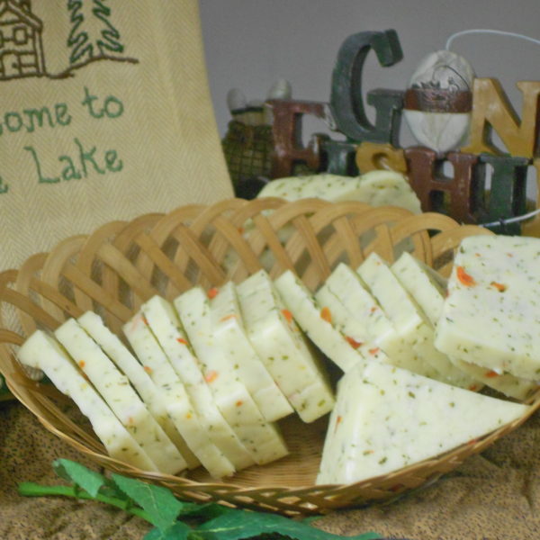 Hickory Smoked Garden Jack cheese slices in a basket on a table
