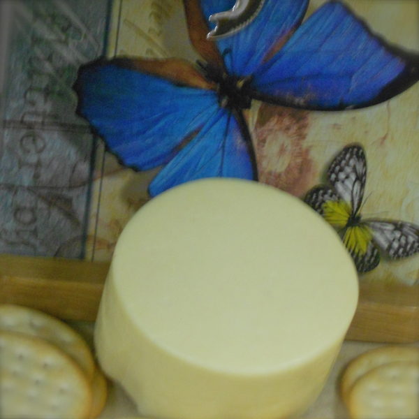 Hickory Smoked Farmers cheese block on a table