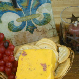 Cheese and Salami cheese block in a basket on a table