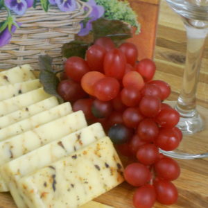 Mediterranean Sunset Cheddar cheese slices on a table