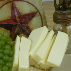 Hickory Smoked Provolone cheese blocks on a table