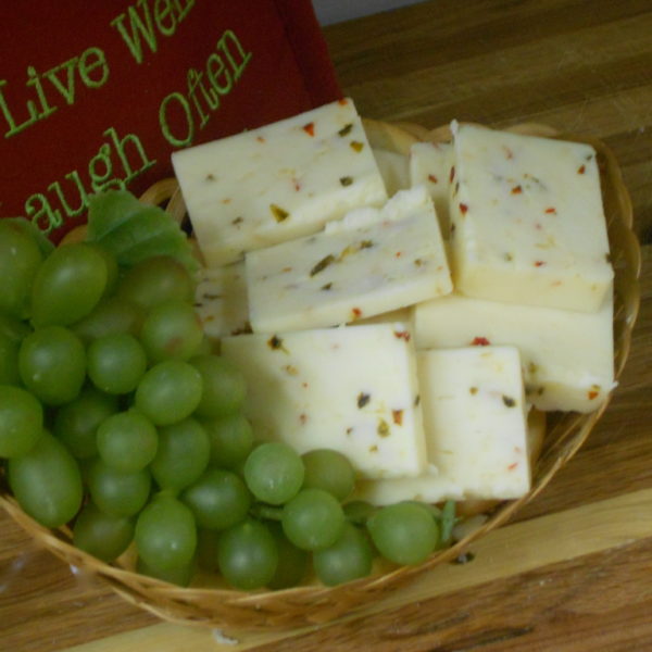 Applewood Smoked Hot Pepper Jack, cheese blocks in a bowl on a table