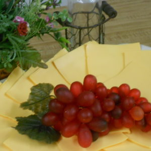 American - 3# Sliced Economy Pack (72 Slices), sliced cheese on a table
