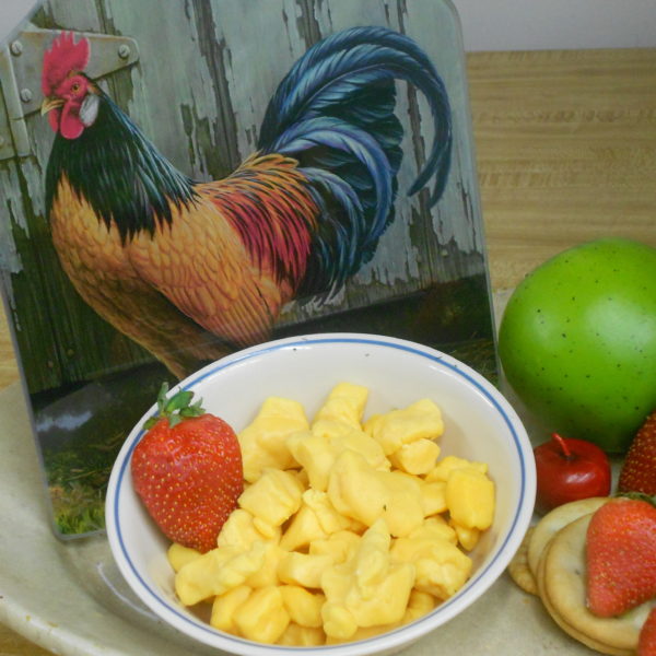 Applewood Smoked Cheddar Cheese Curds, cheese curds in a bowl on a table