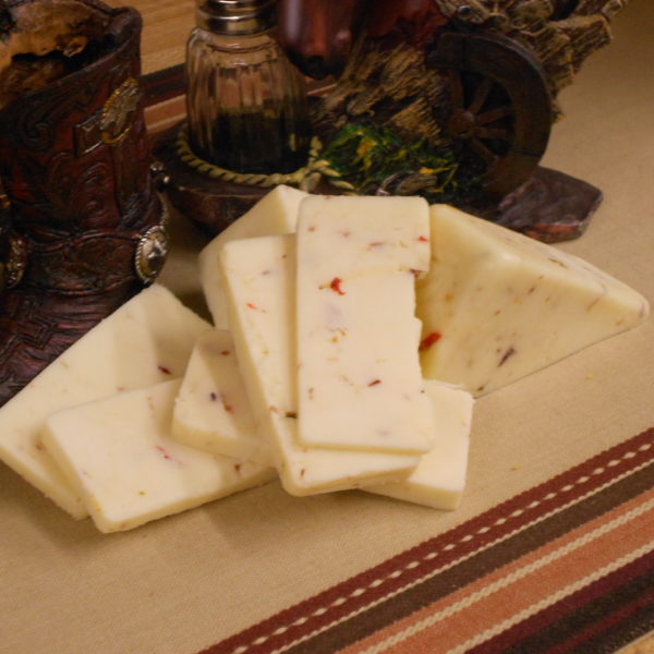 Hickory Smoked Cranberry Jalapeno cheese blocks on a table