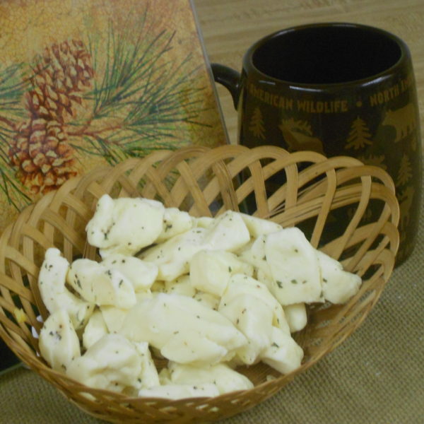 Peppercorn Ranch Curds, cheese pieces in a basket on a table